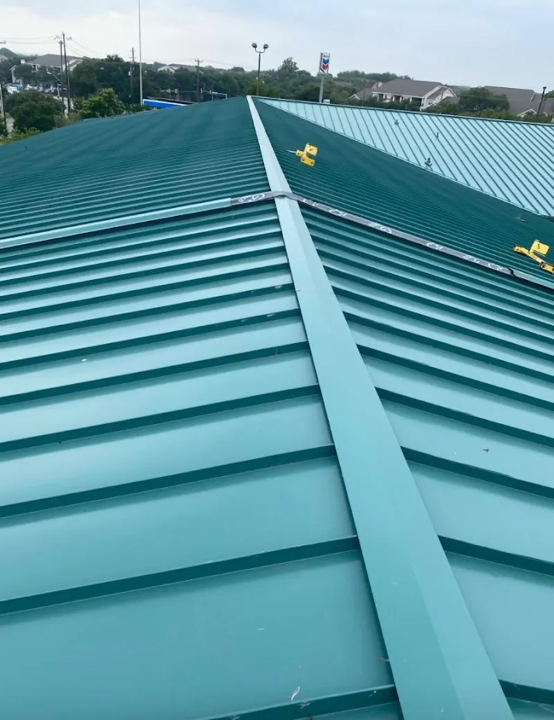 Green commercial metal roof ridge and valley for Metal Roof Repair in Lower Moreland